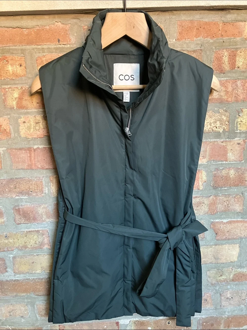 dark green COS high-neck padded vest